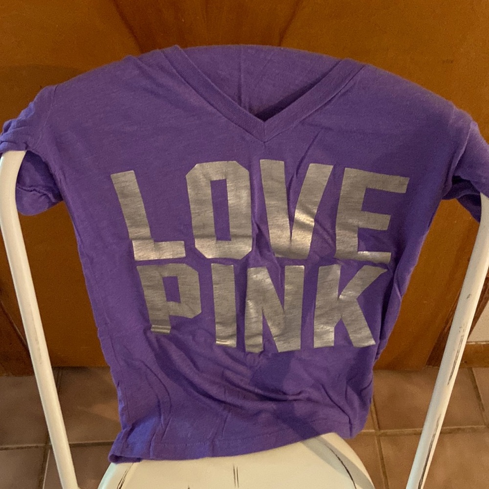 Worn maybe 1x PINK Tee. Purple in color with silver foiled letters.